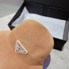 Prada round hat brown / black