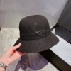 Prada round hat brown / black