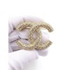 Chanel gold brooch