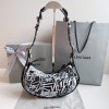 Balenciaga Le Cagole white graffiti XS black shoulder bag