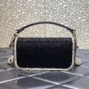 Valentino Garavani small Locò crystal embellished black bag