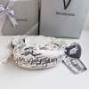 Balenciaga Le Cagole white graffiti XS shoulder bag