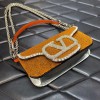 Valentino Garavani small Locò crystal embellished yellow bag