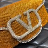 Valentino Garavani small Locò crystal embellished yellow bag