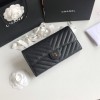 Chanel black chevron caviar gold hardware wallet