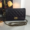 Chanel boy woc black caviar leather in gold & silver hardware