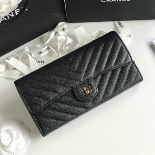 Chanel black chevron caviar gold hardware wallet