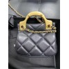 Chanel handle flap bag gold