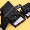 Chanel CC compact black caviar / lambskin wallet