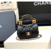 Chanel handle flap bag gold
