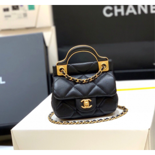 Chanel handle flap bag gold