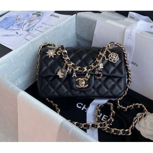 Chanel charm black smooth leather flap bag