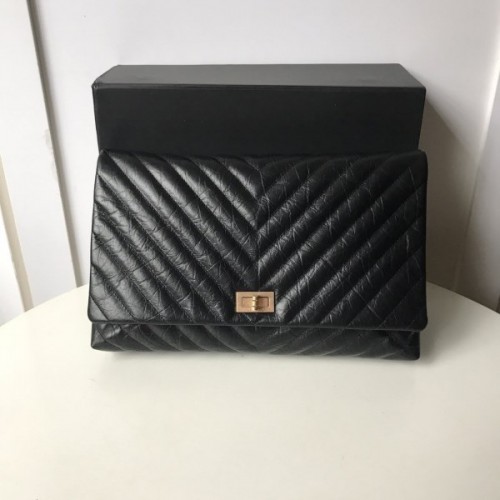 Chanel Palm print calfskin clutch