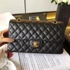 Chanel black medium size 25 cm caviar black gold