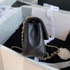 Chanel charm black smooth leather flap bag