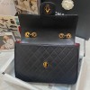 Chanel flap bag caviar gold hardware black leather