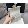Chanel mini smooth leather pearl chain flap bag