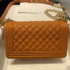 Chanel boy caviar leather yellow 25cm