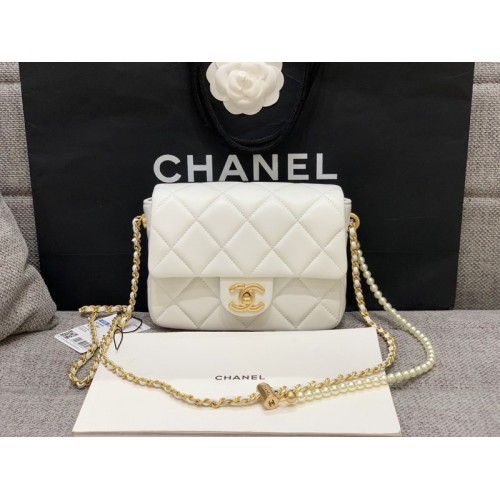 Chanel mini smooth leather pearl chain flap bag