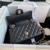 Chanel charm black smooth leather flap bag