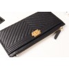 Chanel black quilted zipper wallet