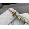 Chanel mini smooth leather pearl chain flap bag
