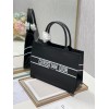 Dior tote book in black leather 36cm
