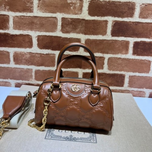 Gucci GG Matelassé leather small duffle beige bag