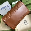 Gucci GG Matelassé leather medium duffle brown bag