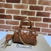 Gucci GG Matelassé leather small duffle beige bag