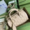 Gucci GG Matelassé leather medium duffle beige bag