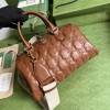 Gucci GG Matelassé leather medium duffle brown bag
