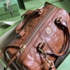 Gucci GG Matelassé leather medium duffle brown bag