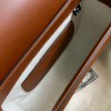 Gucci Embossed brown leather shoulder bag