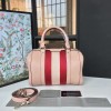 Gucci GG Supreme top handle bag 2206