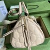 Gucci GG Matelassé leather medium duffle beige bag