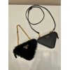 Prada black shearling & saffiano leather mini-pouch