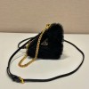 Prada black shearling & saffiano leather mini-pouch