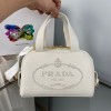 Small leather top-handle white bag