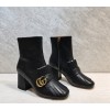Gucci black GG boots