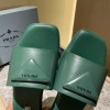 Prada brushed green leather slides