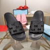 Gucci GG rubber slippers