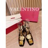 Valentino gold black heels