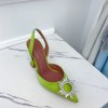 Amina Muaddi green heels