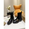 Burberry black patent leather boots