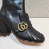 Gucci black GG boots