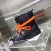 Balenciaga orange puffer boots