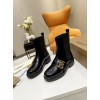Burberry black patent leather boots
