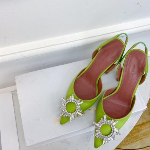 Amina Muaddi green heels