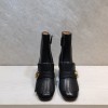 Gucci black GG boots